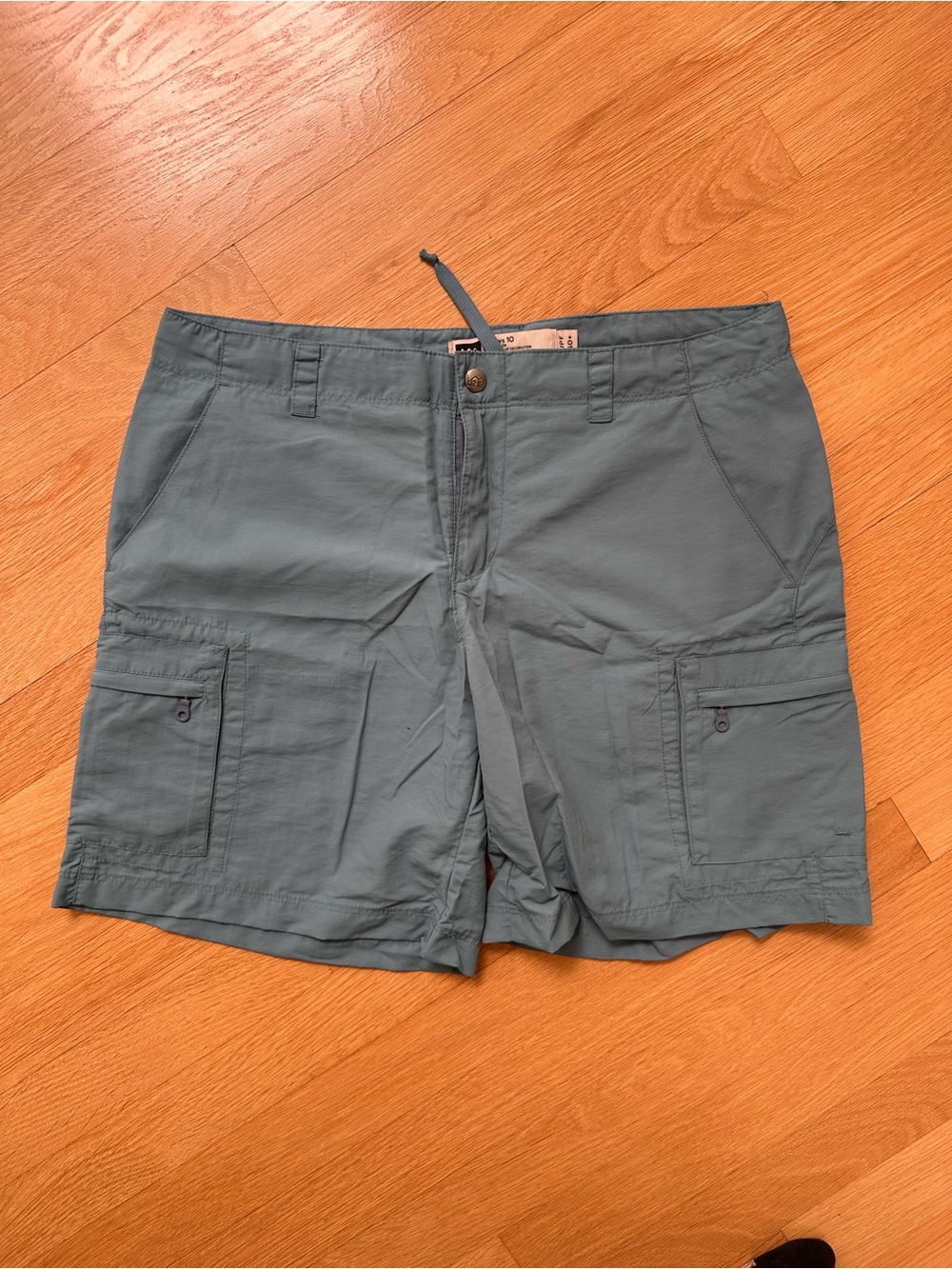 REI blue lightweight hiking cargo shorts, size 10 women's, like new